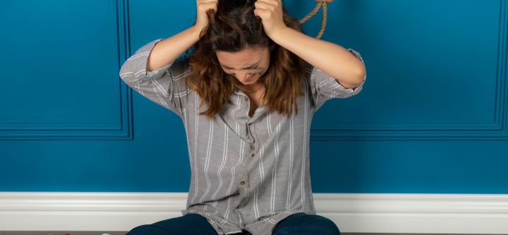 depressed-young-girl-crying-trying-hang-herself-high-quality-photo (1)